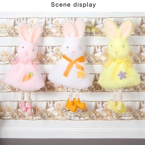 Three plush Easter bunnies in pink, white, and yellow dresses for home window decoration