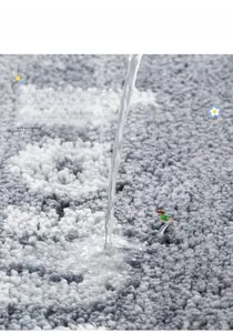 Macro detail of thick checkered bath mat showing fast water absorption with fiber texture