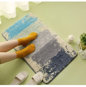 Detailed macro view of soft plush texture and thick edges on a geometric bathroom mat
