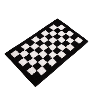 Black and white checkerboard bathroom rug with plush non-slip texture for home decor