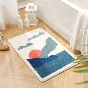 Absorbent bath mat with sunrise pattern and anti-slip backing for bathroom floor