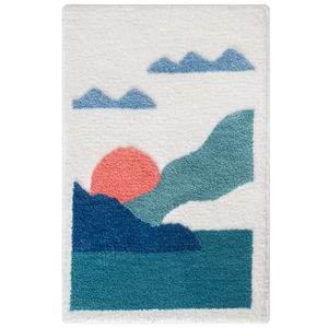 Absorbent bathroom rug with abstract mountain and sun tufted design for home decor