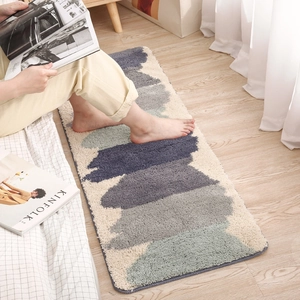 Detailed view of soft long-pile plush bedside rug with Morandi geometric pattern blocks