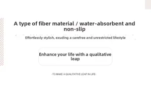 Detail view of the absorbent fiber material and non-slip backing of the cream bathroom mat