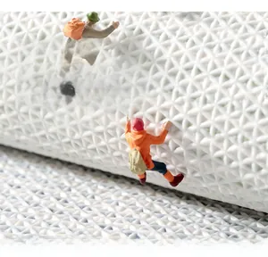 Macro detail of white TPR anti-slip backing with dense geometric texture for bathroom mat