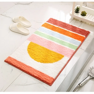Detail of colorful striped bath mat with thick flocking texture and non-slip backing