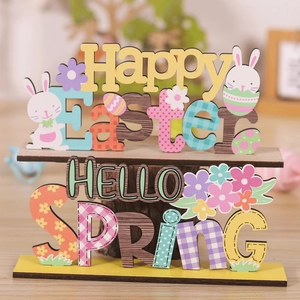 Close-up of Happy Easter laser-cut wooden sign with rabbits and spring flower motifs