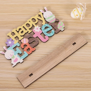 Flat lay of wooden Happy Easter tabletop sign with cartoon bunny and floral patterns