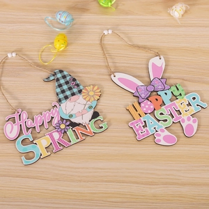 Close-up of wooden Easter ornaments featuring gnome and bunny ears with hanging beads