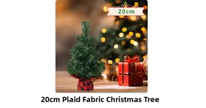 Close-up of 20cm artificial Christmas tree with red and black plaid fabric base decor