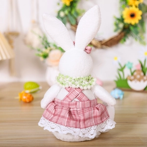 Detail of plush Easter bunny wearing pink plaid dress and lace trim from back view