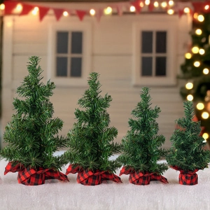 Set of four buffalo plaid base Christmas trees in various sizes for tabletop decor