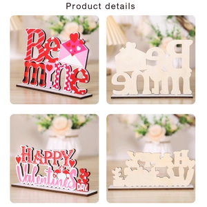 Detail of pink and red Valentine's Day wood signs with Be Mine and Happy Valentine text