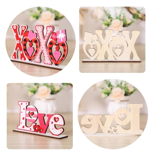 Detailed front and back view of wooden Love and XOXO Valentine signs with heart patterns