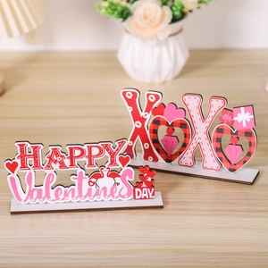 Wooden Valentine's Day tabletop decor with Happy Valentine's Day and XOXO heart signs