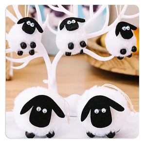 Set of five plush sheep hanging ornaments with soft white fur and black felt faces