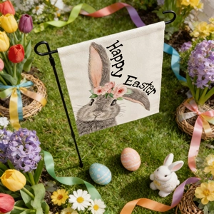 Close-up of Easter garden flag with bunny and flowers on a lawn with festive eggs