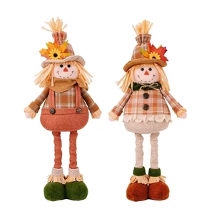 Scarecrow gnome dolls set with maple leaves and sunflowers for harvest festival decor