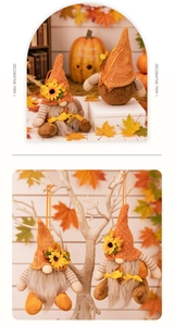 Detail showing plush autumn gnomes with orange knit hats, sunflowers, and hanging loops