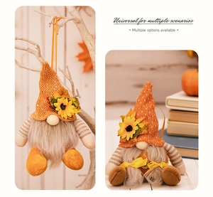 Close-up of autumn gnomes with sunflower hats for Thanksgiving table decoration