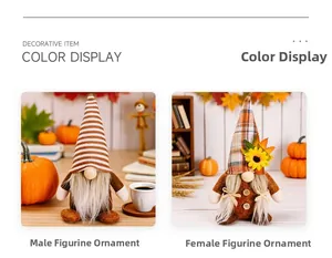 Detailed view of harvest festival male and female gnomes with autumn sunflower accents