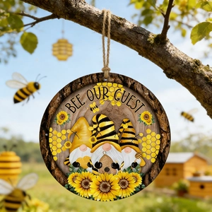 Round wooden hanging sign featuring bee gnomes, sunflowers, and Bee Our Guest text