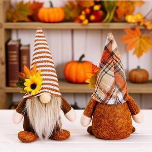 Set of two autumn harvest gnomes with sunflowers and plaid hats for Thanksgiving decor