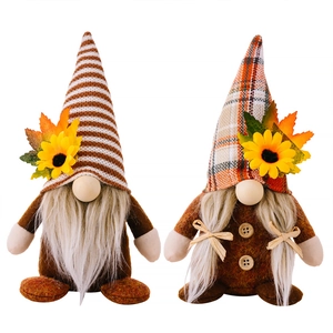 Fall harvest gnomes with sunflowers and maple leaves for Thanksgiving home decoration