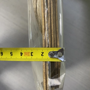 Detail showing measurement of 6-piece DIY blank wood signs stack about 2cm thick