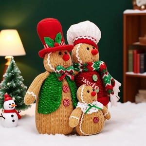 Three-piece knitted gingerbread man family set with festive hats and scarves for Christmas decor