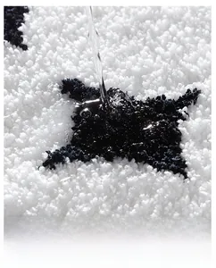 Close-up of high-density cream shag rug with star patterns and absorbent fibers