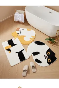 Detailed view of high-density plush cat-shaped bathroom mats with non-slip backing