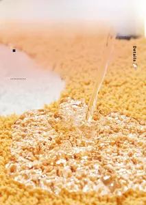 Macro detail of high-absorbent chenille fibers on a cartoon cat-themed bathroom rug
