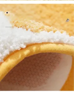 Detailed macro view showing the thick plush texture and non-slip backing of the cat mat