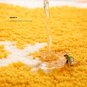 Micro shot of absorbent yellow and white fiber bath mat showing quick water absorption