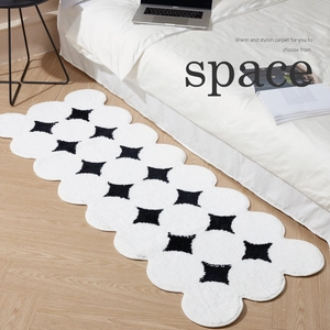 Cloud-shaped thickened plush runner rug with black flower patterns for bedrooms