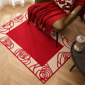 Festive red rose patterned welcome mat on wooden floor for modern home entryway decor