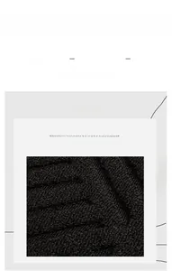 Detailed macro shot of the durable polypropylene fibers and textured weave of the doormat