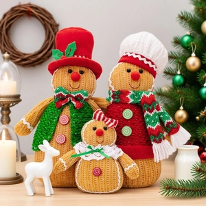 Three-piece family set of knitted gingerbread man figurines for Christmas home decoration