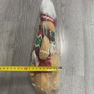 Detailed top view showing a gingerbread gnome plush with measuring tape for 8-9cm width