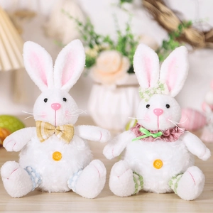 Detail of Easter bunny plush set with floral bow, plaid bowtie and polka dot patterns
