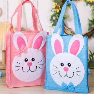 Détails des sacs cadeaux lapin de Pâques en feutrine avec nœuds et texture