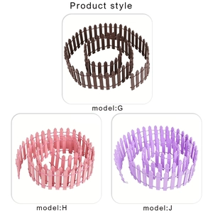 Three colors of 90cm miniature DIY wood picket fences including brown, pink, and purple