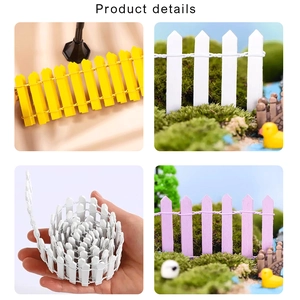 Miniature wooden fence details showing flexible wire connection and macro colorful wood slats