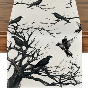 Halloween linen table runner with black crow and dry tree ink print on rustic wooden table