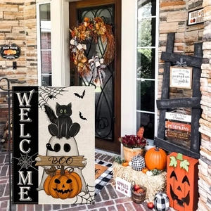 Halloween garden flag with black cat, ghost and pumpkin decorations and Welcome text
