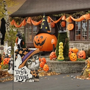 Detail of Halloween garden flag with a cat in a wizard hat and Trick or Treat text