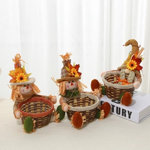 Three Thanksgiving harvest candy baskets with gnomes, scarecrows and maple leaf decorations