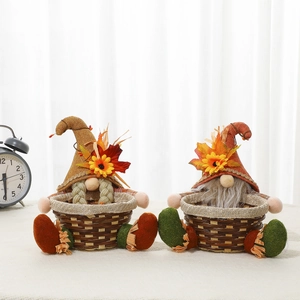 Harvest gnome candy baskets with sunflower hats and fall leaves for Thanksgiving decor