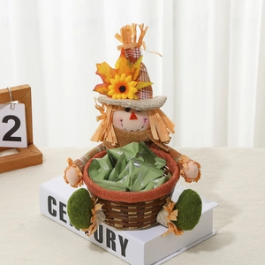 Macro detail of gnome scarecrow candy basket with sunflower hat and woven autumn design